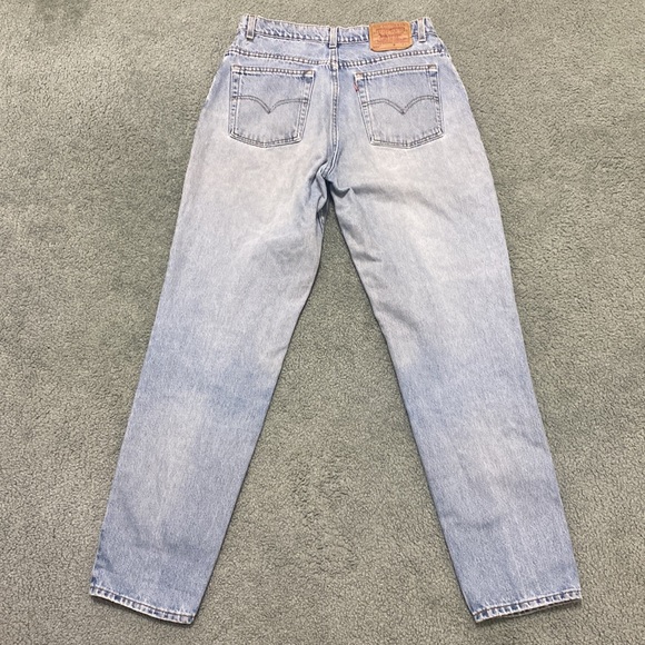 90's Vintage 550 Levi's Relaxed Fit with Tapered Leg faded blue jeans USA made - Picture 2 of 11